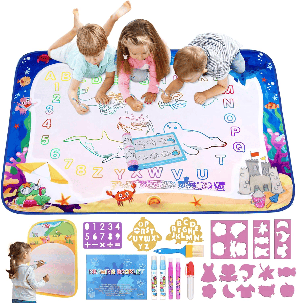 3 children laying on water mat drawing 