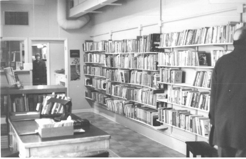 Man looking for books in the library