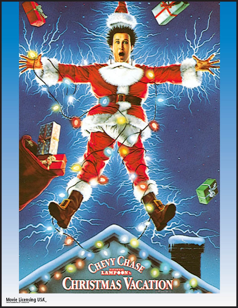 man in santa suit christmas lights rooftop