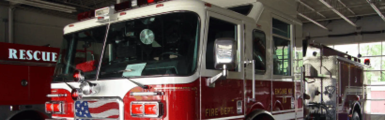 red and white fire engine.